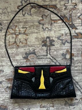 Vintage Black Leather Clutch or Shoulder Bag Purse with Red and Yellow Accents